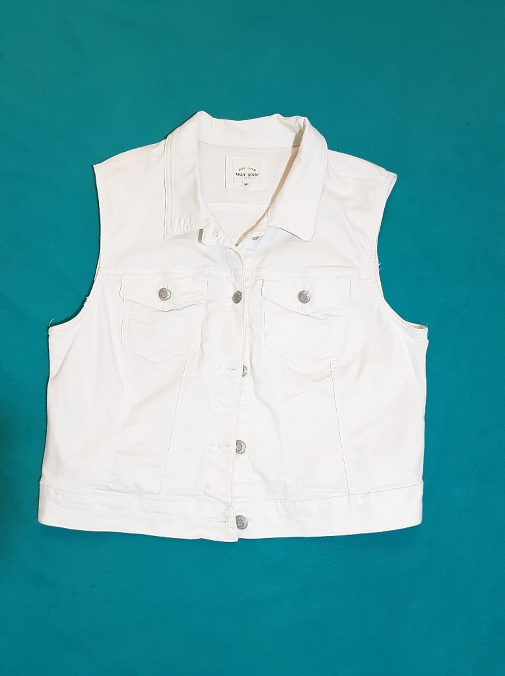 White Sleeveless Button-Front Denim Vest